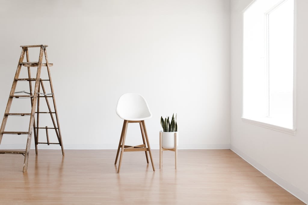 White Round Table Near White Wall